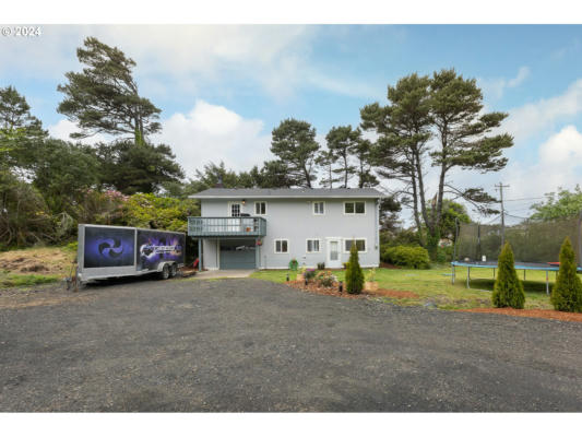1051 NW ART ST, SEAL ROCK, OR 97376 - Image 1